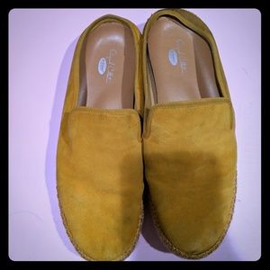 Yellow suede slides